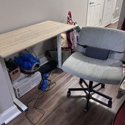 Adjustable standing desk (sit/stand) • Light wood top with white legs • Gray rolling office chair with lumbar support CASH ONLY!!!