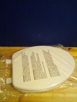 Plastic oval white toilet seat