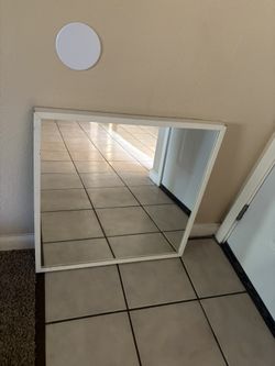 mirror in a wooden frame