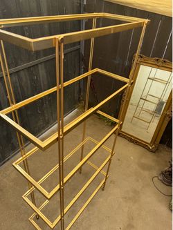 Gold and glass shelves
