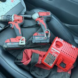 Milwaukee Set 1/2 Impact gun And A Impact Drill 