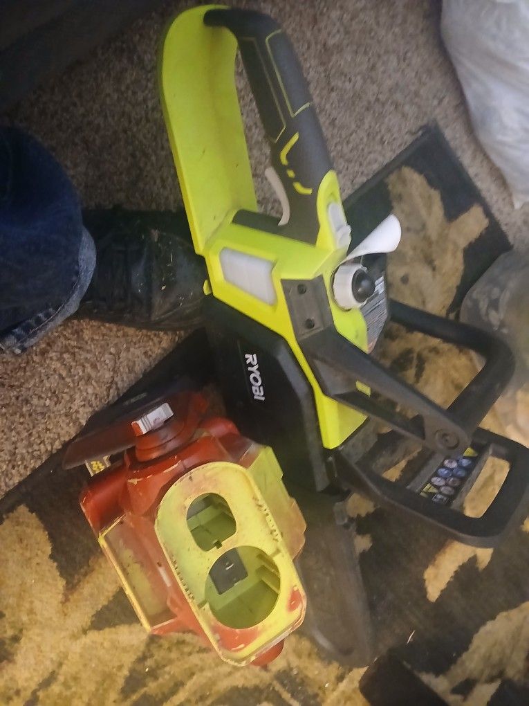 Ryobi Chainsaw And Floodlight