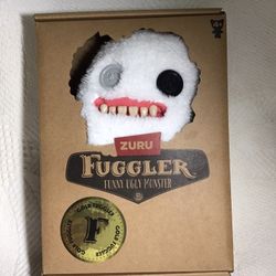 FUGGLER FUNNY UGLY MONSTERS  / 2 White / 2 Blue/ 1 Purple Each $17 