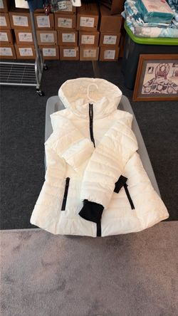 Brand new hooded, puffer jacket in white and black