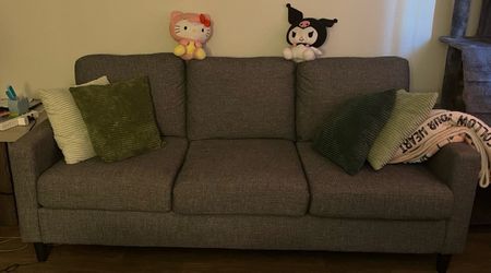 Living spaces grey couch