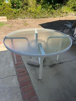 Outdoor glass table w/hold for umbrella