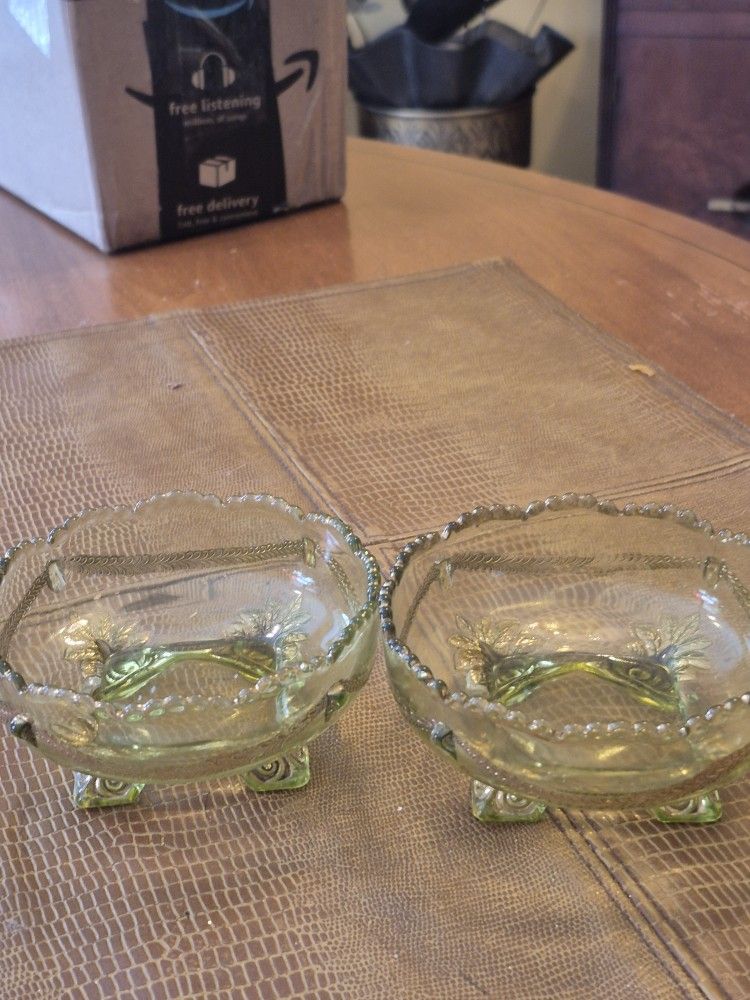 Two vintage yellow glass depression bowls footed