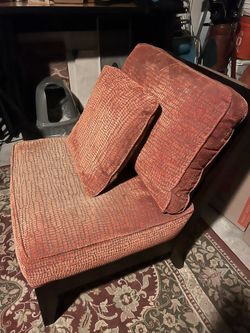 Red Armless Chair with Pillow