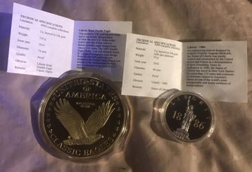 Proof coins layered in 24kt