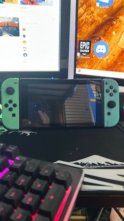Nintendo Switch with Teal Joy-Cons