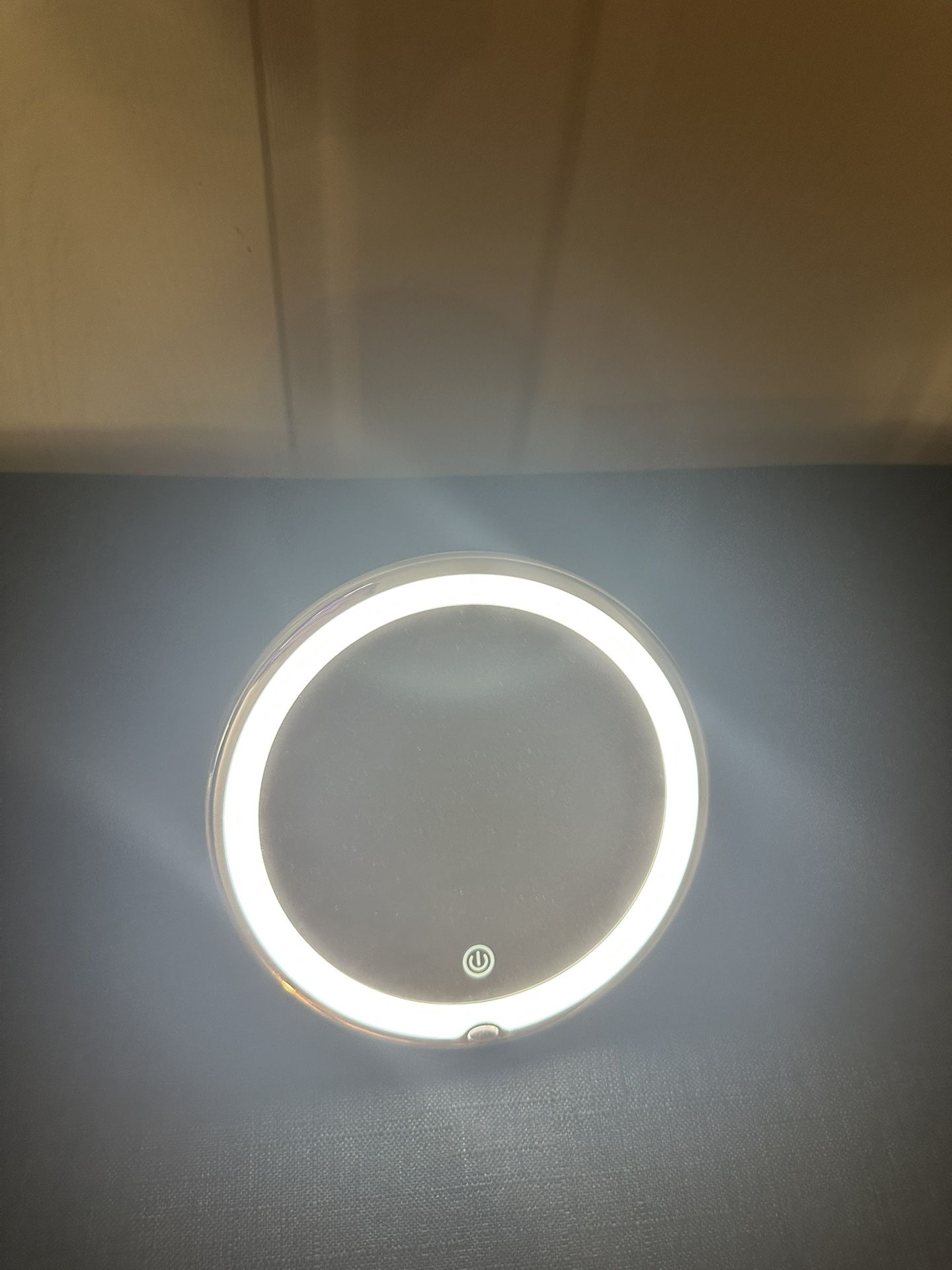Round LED magnifying vanity mirror