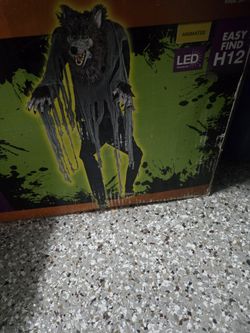 Home Accents 6 ft 6 in LED Towering Werewolf, an animatronic Halloween decoration