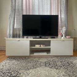 Tv stand with drawers for sale.