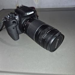 Canon digital camera w/ screen adjust and SLR 300 lens