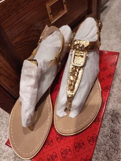 Cute Brand New Rehan metallic gold guess sandal..size 8.5.