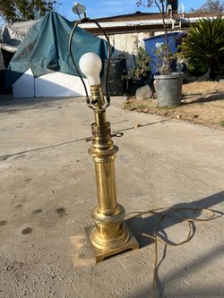 Brass tone table lamp 28 inches