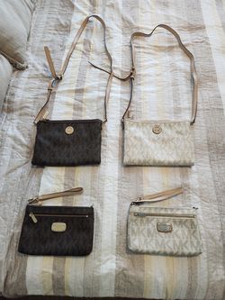 Authentic Michael Kors purses and clutches. $25 each or $80 for all