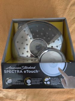 Brand new American Standard SPECTRA eTouch chrome shower head.