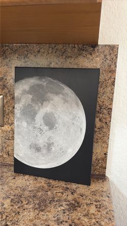 This is a painting of the moon good for kids rooms.
