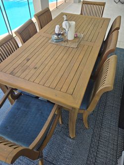 Teak patio table and chairs