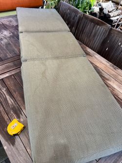 1x sunbrella Brand lounge chaise chair cushion in light green  Located in concord  Measures 80” long.       24” wide.         5” thick  $50 or best of