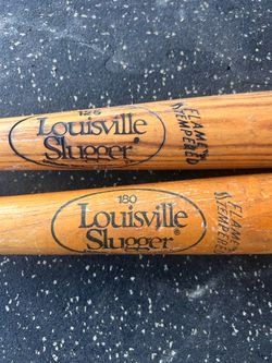 Genuine wood Louisville Slugger bats