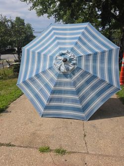 Beautiful 8-ft patio umbrella the price is firm