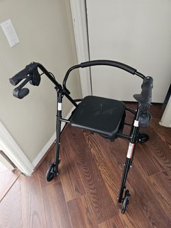 Walker with seat