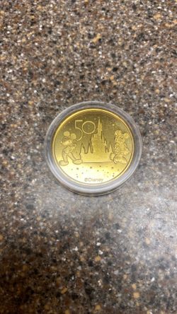 Disney 50 year collector coin.