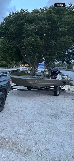 1860 grizzly camo 19 foot open fisherman