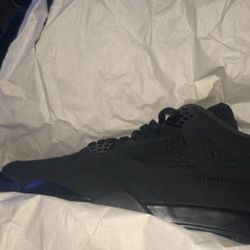 Black Cat Jordan 4s