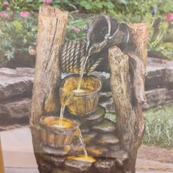 Indoor outdoor waterfall fountain, new in box LED .Waterbucket