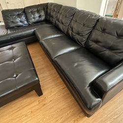Black Leather Sectional Sofa + Ottoman with Storage Drawer - $400