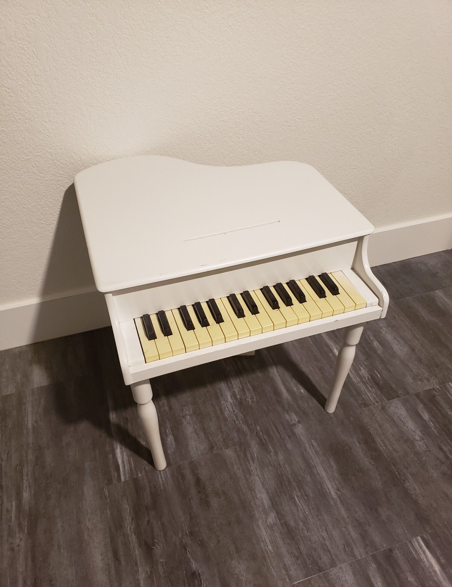 White Schoenhut Miniature Piano