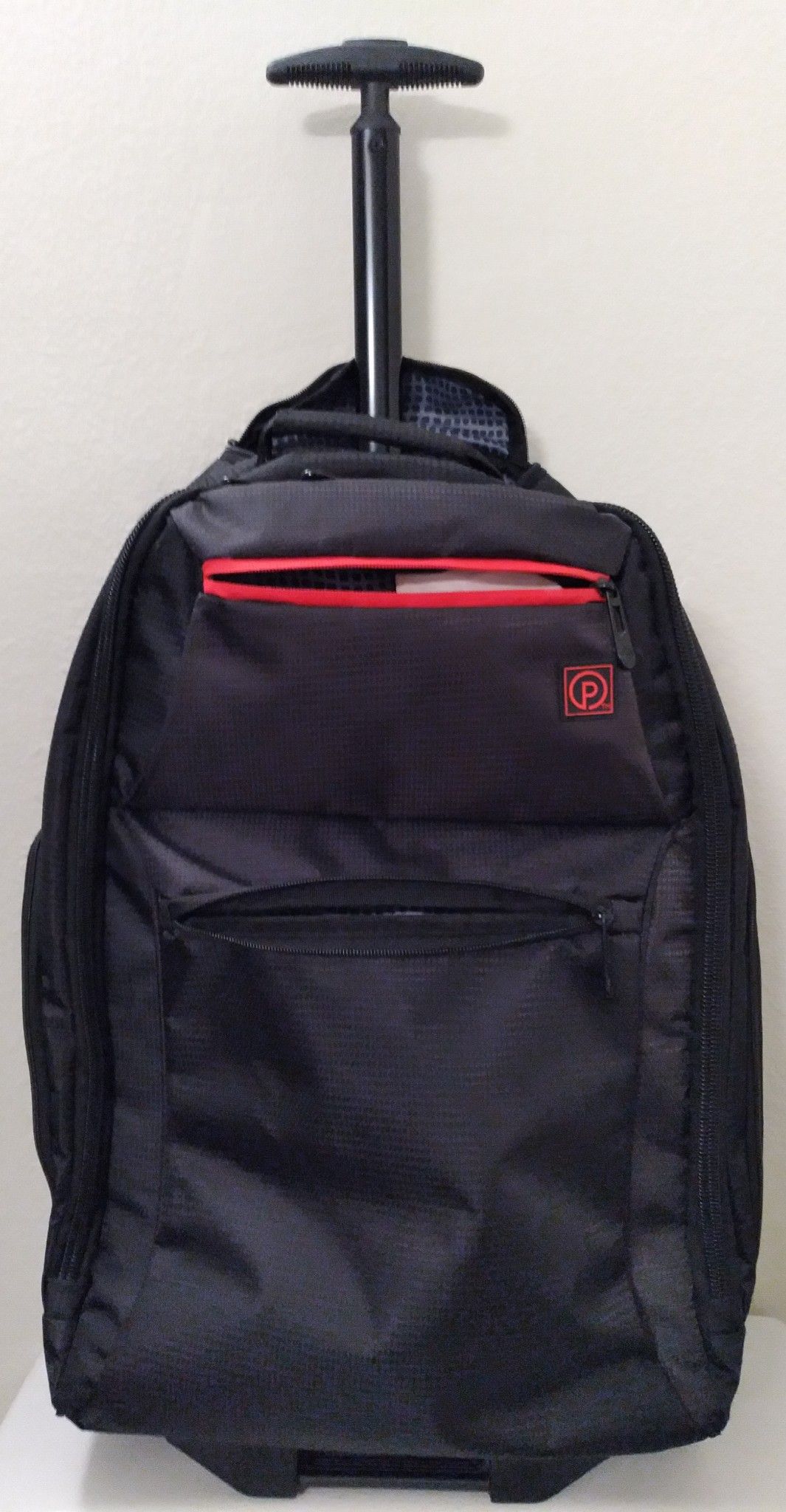 BRAND NEW! NEVER USED! WEEKENDER 24" ROLLING BACKPACK CARRY-ON WITH PULL-UP HANDLE