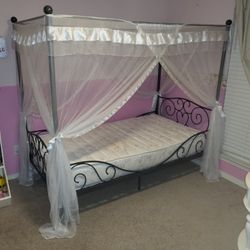 Metal Canopy twin bed with mattress and white canopy