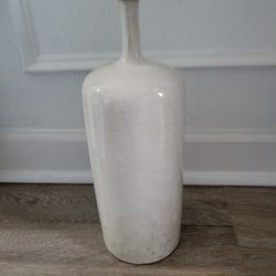 A White Vase That's About 14 Inches Tall 