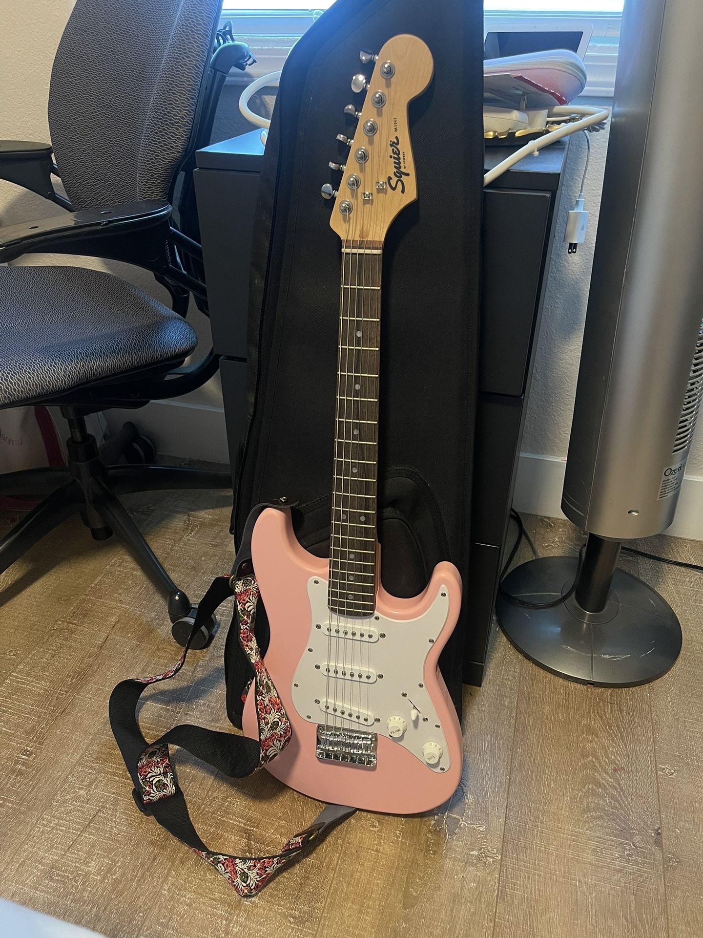 pink SQUIER Fender mini guitar