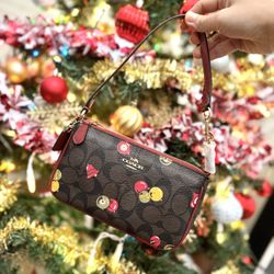Coach Nolita 19 In Signature Canvas With Ornament Print