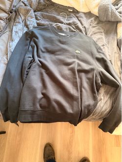 Lacoste Sport," "Crewneck Sweatshirt," "V-stitch," and explicitly list both sizes ("US XXL / FR 7")