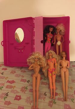 Barbie case with dolls