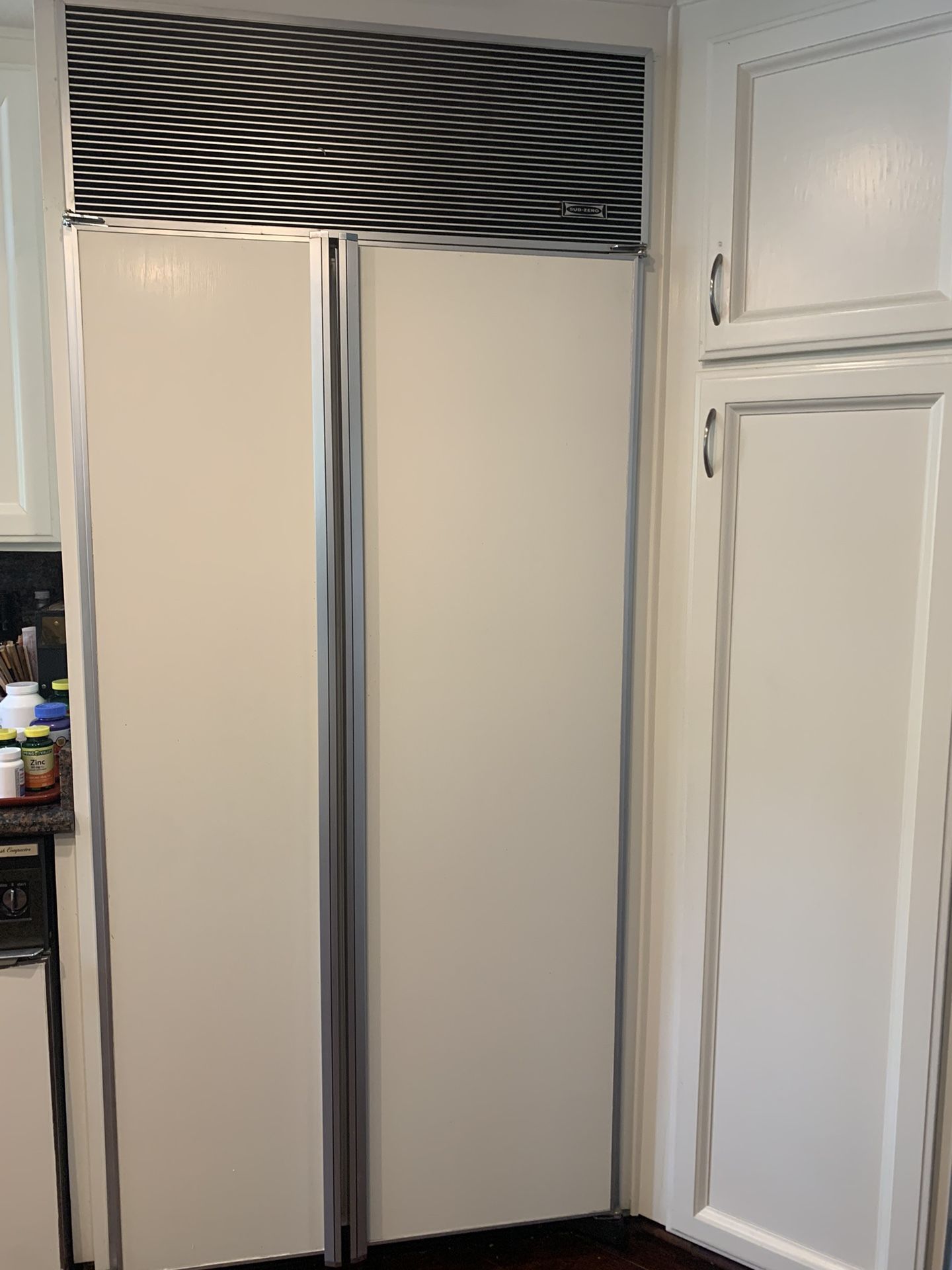 Sub-Zero fridge/freezer, white paint Overlay and Stainless Steel, Model #561, 21 cu ft