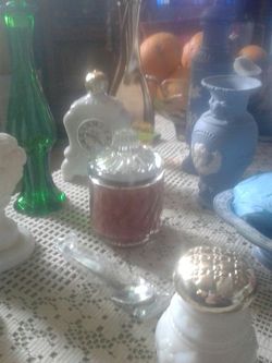 Many Antique Avon bottles
