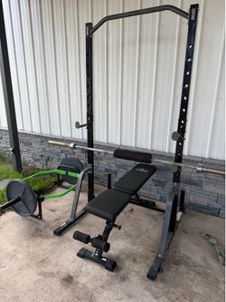 250lb weight set, tower, bench and deadlift bar