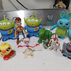 Pixar Toy Story action figures.  
-  2  Electronic Talking light-up Allien doll 
-  Bunny Poseable Electronic talking  doll blue
-  Rex dinosaur 
- Du