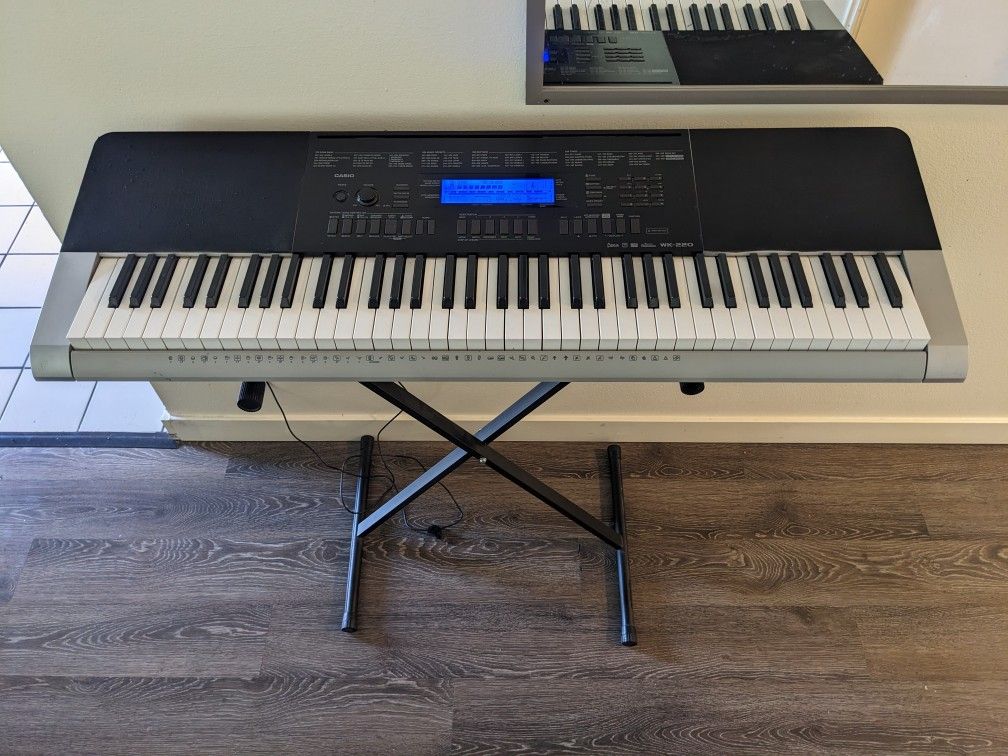 Casio Semi Weighted 76-Key Electronic Piano Keyboard - 76 Touch-Sensitive keys, 600 tones, 180 rhythms, Midi + Stand/Power Cord (WK-220 MSRP $499)