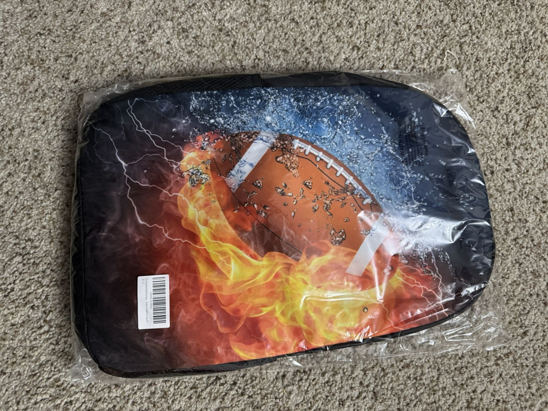 Fun Football Themed Backpack. New In Package Never Used.