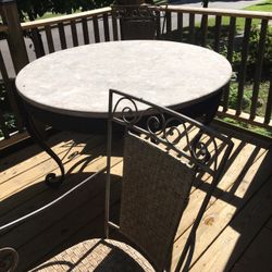 Tables and chairs (4) ,Metal and Wicker with heavy top