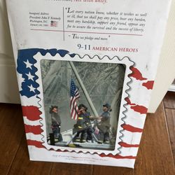 Commemorative 2001 Metal Poster Of “The Heroes Of 9/11/2001 Featuring The Iconic “Raising Of The Flag “at Ground Zero “ Photograph