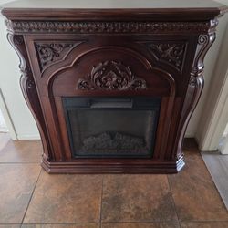 Febo Cherry Carved Wood Electric Fireplace.  Not Working Needs Some Fixing In The Back 